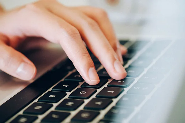 laptop typing. alert1 medical alert systems